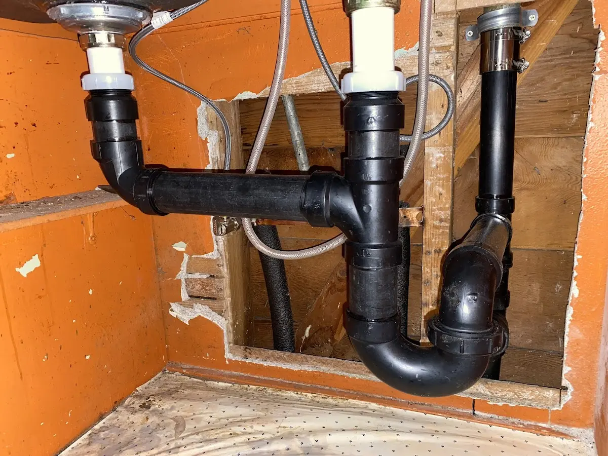 Professional Garbage Disposal Repair equipment and tools on the job in Heath